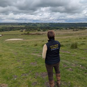 Farm491 team member overlooking a field