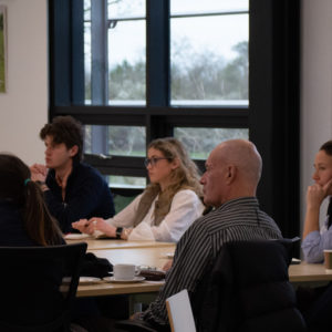 Croissants and Questions attendees seated