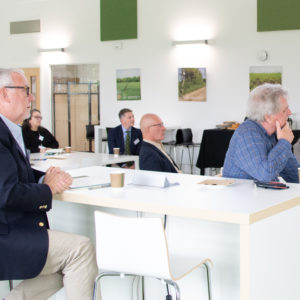 Seated delegates in a contemporary space